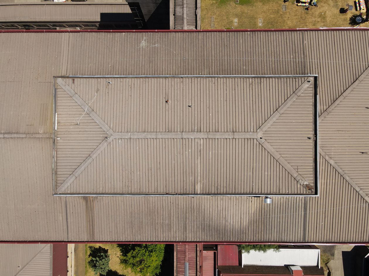 Aerial view of a large commercial low-slope rooftop