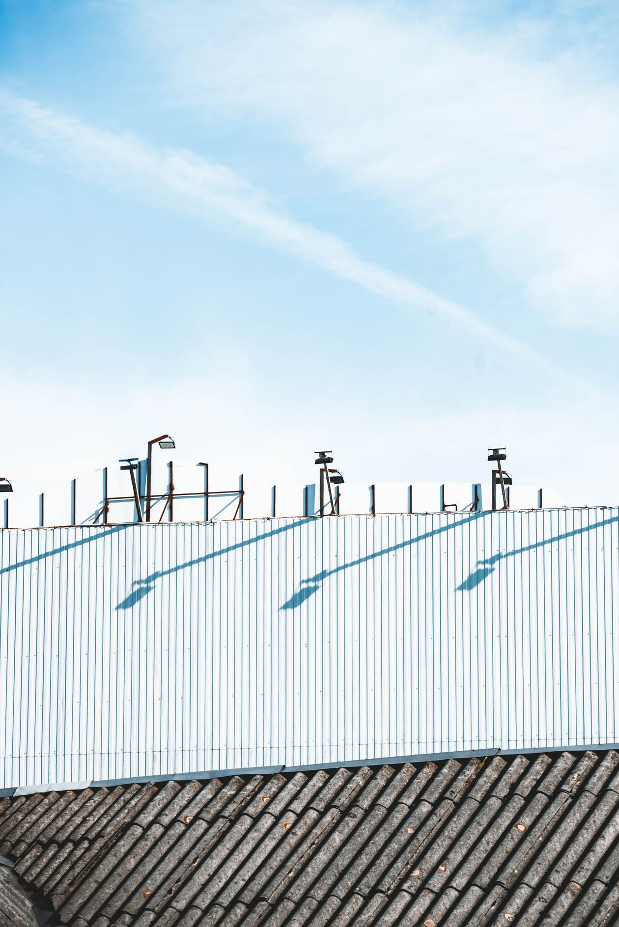Existing corrugated metal roof on an industrial building